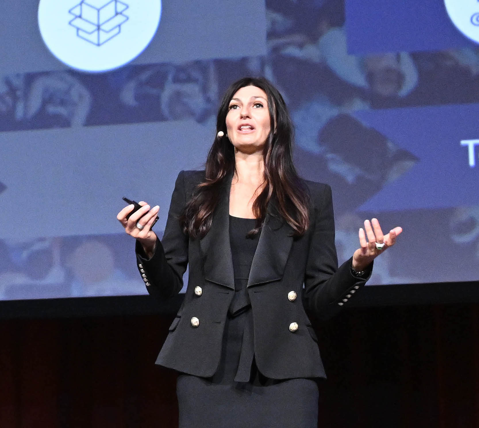 Jacqui Henderson, Founder of MoneyPattern, speaking on stage.